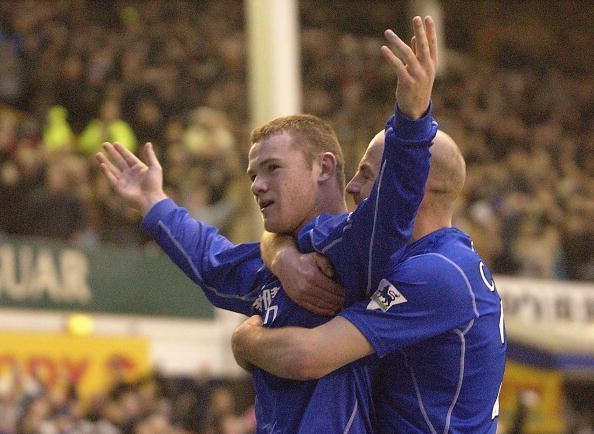 Rooney celebrates scoring