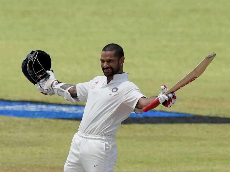 Shikhar Dhawan celebrating after scoring a superb hundred on day 1