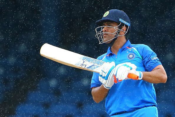 Dhoni and Bhuvneshwar overcame a sizzling Dananjaya spell to take India home