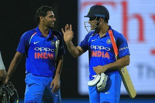 MS Dhoni (right) scored an unbeaten 45 against Sri Lanka last night