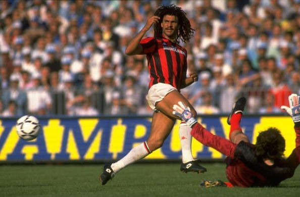 Ruud Gullit of AC Milan races to intercept the ball