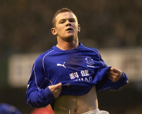 Rooney celebrates scoring