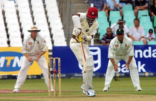 West Indies batsman Brian Lara (C) is fr : News Photo