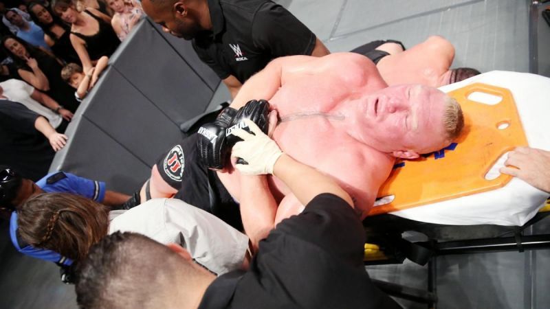 Brock Lesnar stretchered out