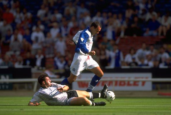 Mark Atkins of Blackburn Rovers and David Unsworth of Everton