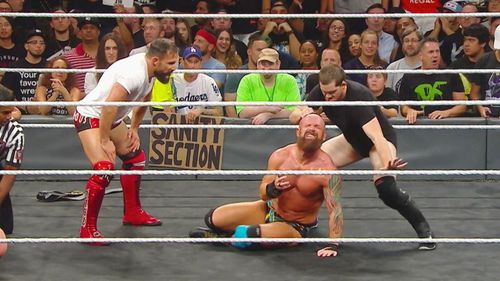 Kyle O'Reilly and Bobby Fish laying waste to Eric Young