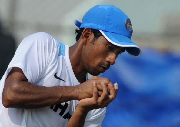 India's Wriddhiman Saha holds a catch du : News Photo