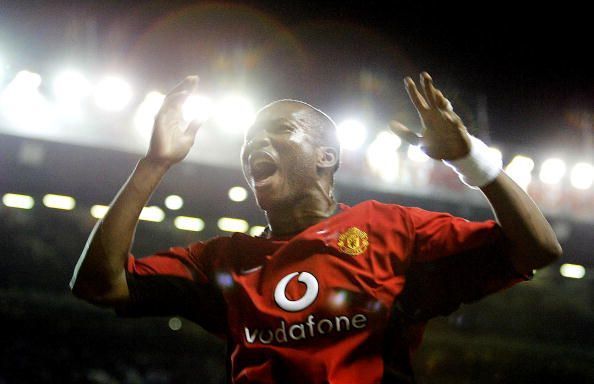 Eric Djemba Djemba celebrates 