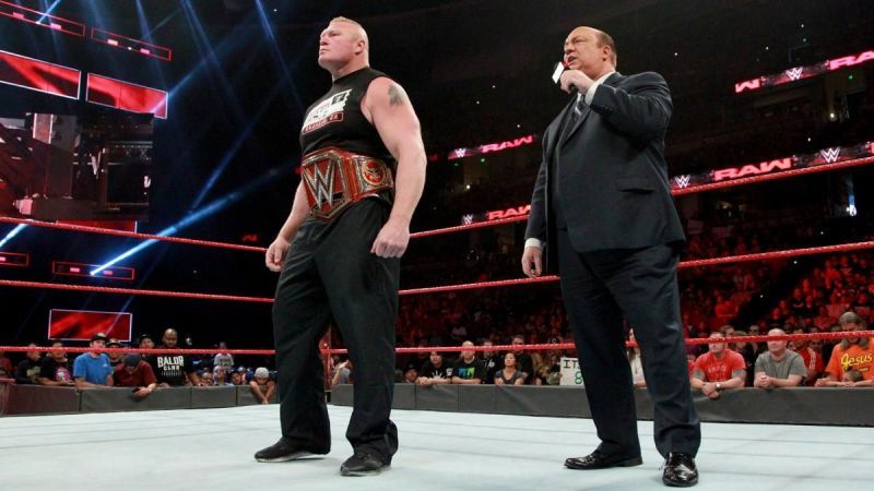 Brock Lesnar and Paul Heyman addressing the WWE Universe