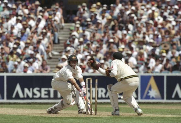 Greg Blewett of Australia is stumped by Dave Richardson of South Africa