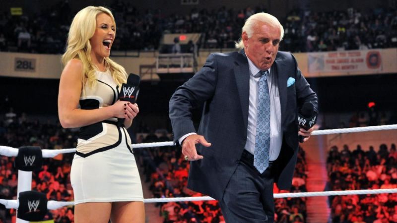 Ric Flair strutting for Renee Young