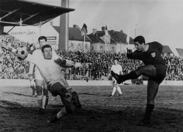 Gerd Muller goes for goal