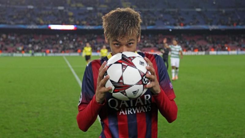 Neymar with the match ball after scoring a hat-trick
