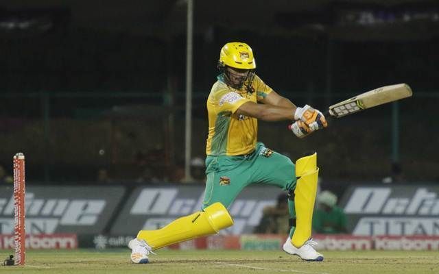 Bharath Chipli drives through the covers during a KPL match