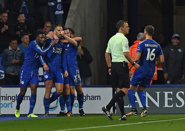 Leicester players celebrate Slimani&#039;s second goal