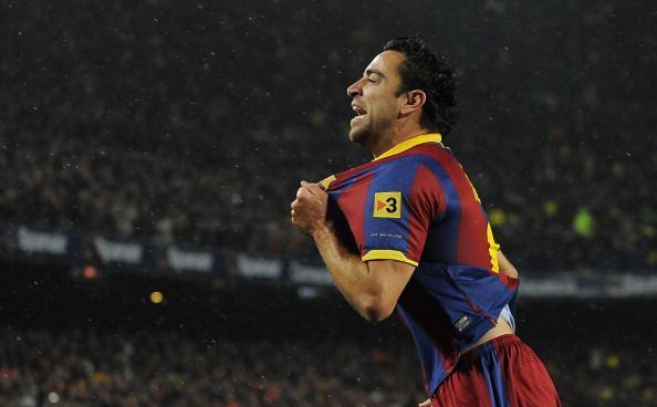 Xavi and Iniesta formed a potent midfield partnership for both Spain and Barcelona