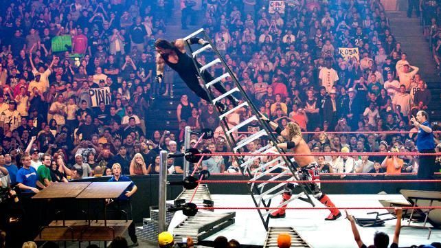 The Undertaker is pushed off a ladder by Edge in a WWE Tables, Ladders and Chairs match; the TLC match has become a huge attraction in WWE