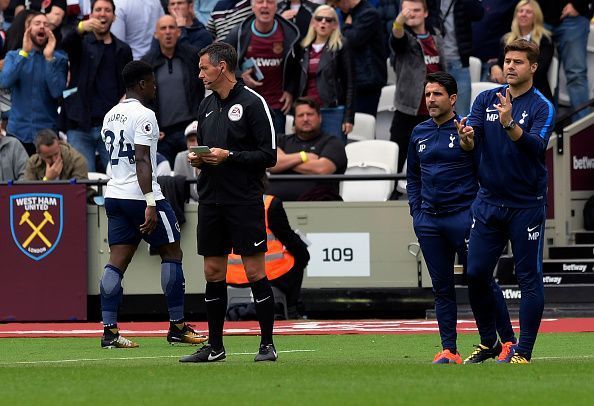 Serge Aurier walks back after being sent off