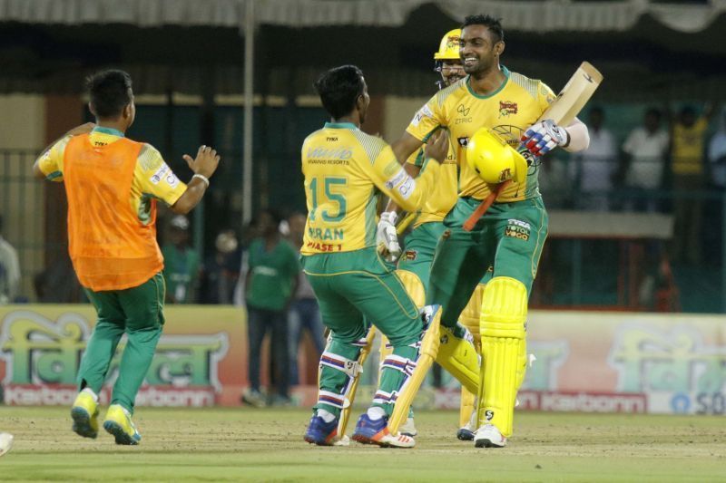 Mithun celebrates with his team-mates after sealing the match for the Bulls