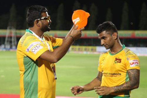 Nidesh held the Orange Cup before Stuart Binny's heroics later that night