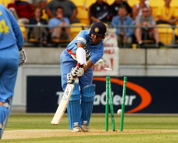 India&#039;s Dinesh Mongia is clean bowled by New Zeala