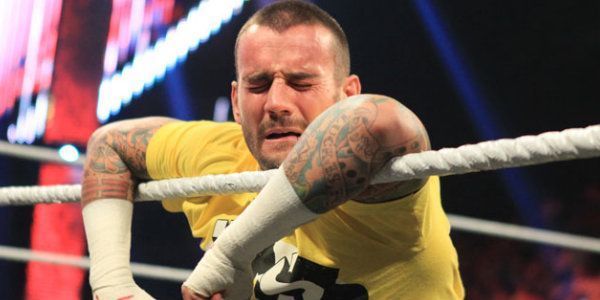CM Punk on the ropes in a WWE ring