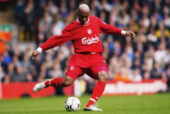 El Hadji Diouf of Liverpool strikes the ball