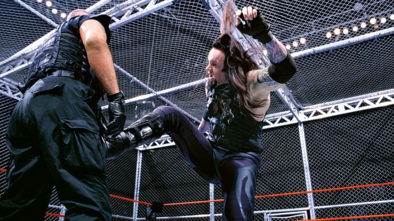 The Undertaker does battle with Big Boss Man