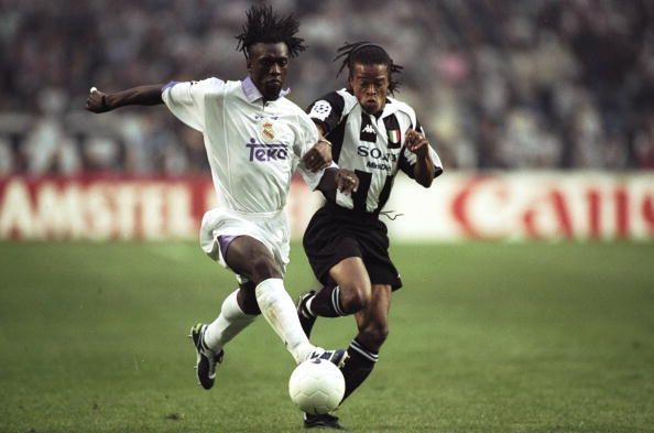 Clarence Seedorf of Real Madrid and Edgar Davids of Juventus