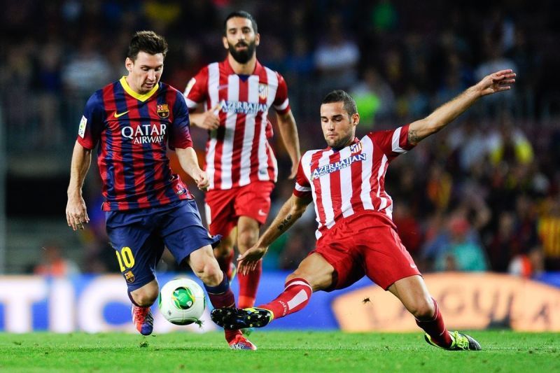 Koke goes hard to stop Messi