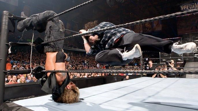 Mick Foley punishes Edge at WrestleMania 22