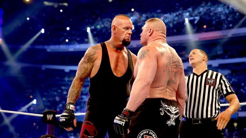 Undertaker and Brock Lesnar staring each other down at WrestleMania XXX