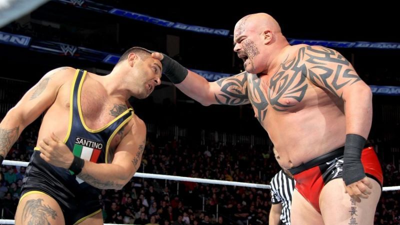 Lord Tensai doing battle with Santino Marella