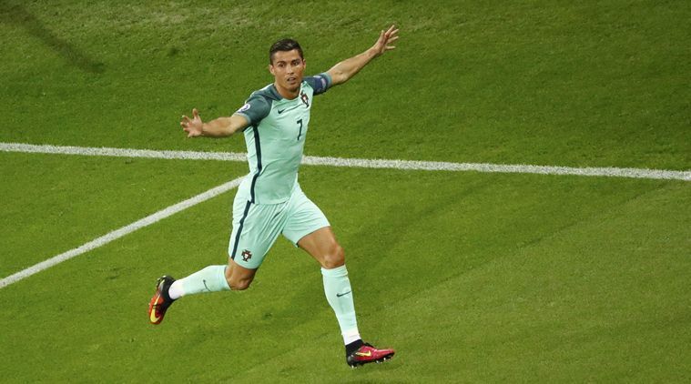 Ronaldo celebrating after scoring against Wales.