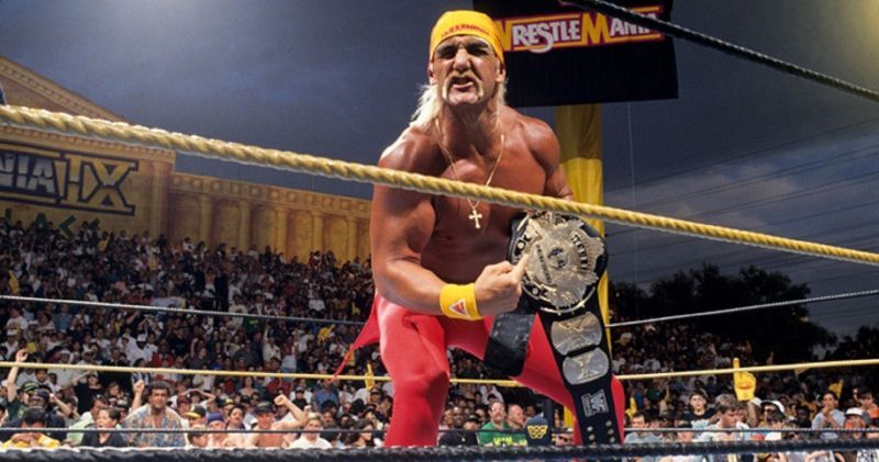 Hulk Hogan holding the title at Wrestlemania 9