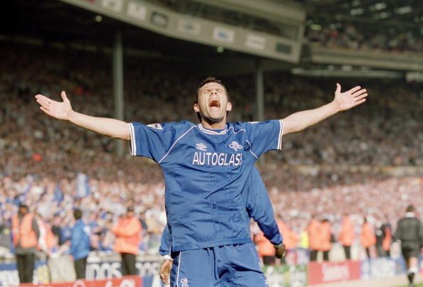 Gustavo Poyet celebrates for Chelsea