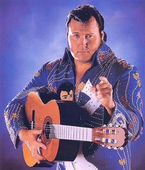 Honky Tonk Man, an Evil Elvis impersonator. 