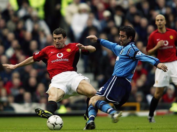 Kevin Horlock of Manchester City and Roy Keane of Manchester United