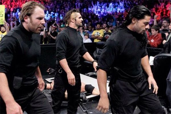 Dean Ambrose, Seth Rollins and Roman Reigns arrive and wreak havoc