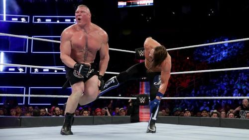 Styles wisely goes after Lesnar's knee.