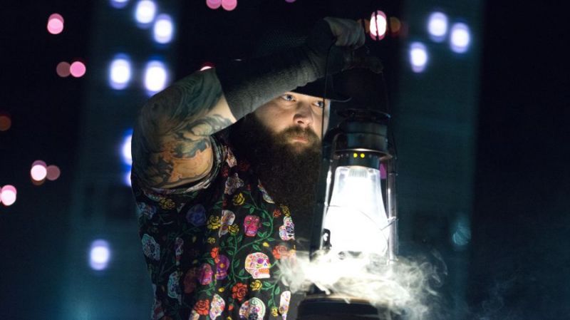 Bray Wyatt has all of the lights turned off for his entrance, so needs a lamp to find his way to the ring.  Makes about as much sense as his booking.