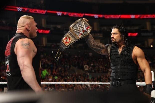 Roman Reigns in the ring with Brock Lesnar