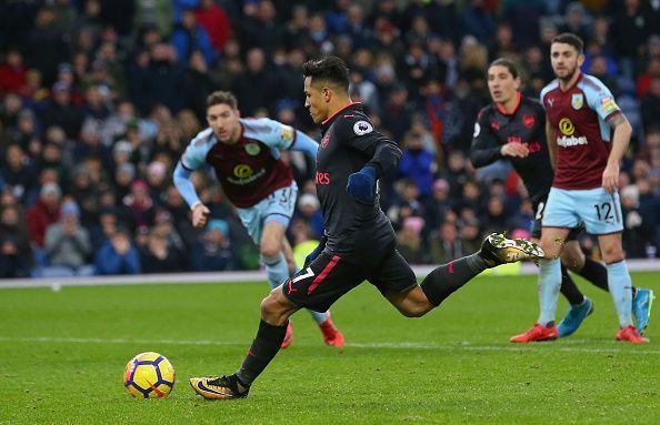 Sanchez converting a stoppage time penalty against Burnley