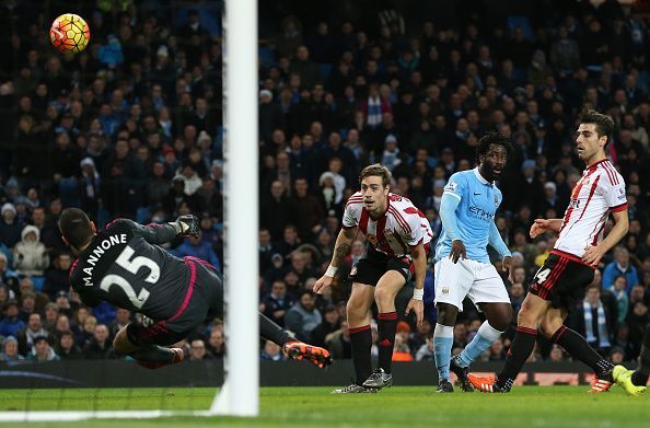 Bony watches Mannone attempt a save for Sunderland