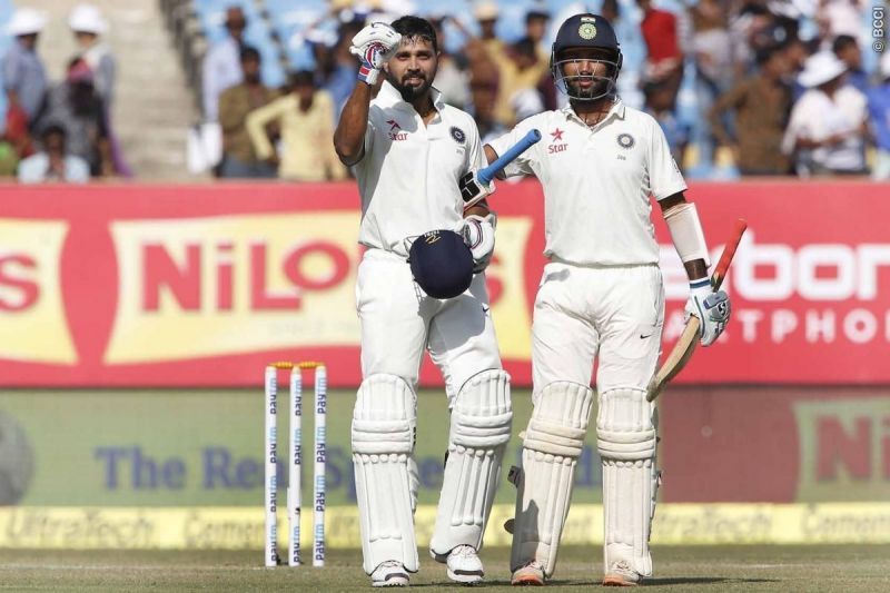Vijay and Pujara brought up another milestone on day two