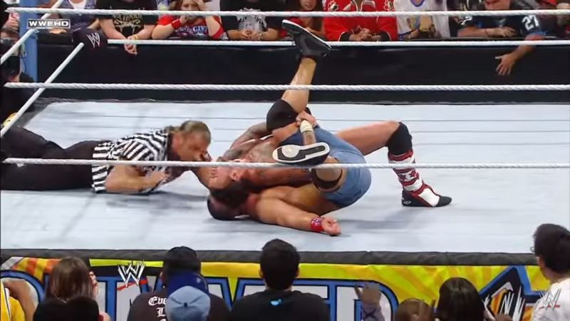 Triple H missed Cena's foot on the bottom rope.