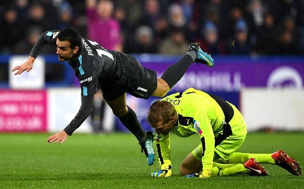 Jonas Lossl(in green) was a victim of the playing conditions