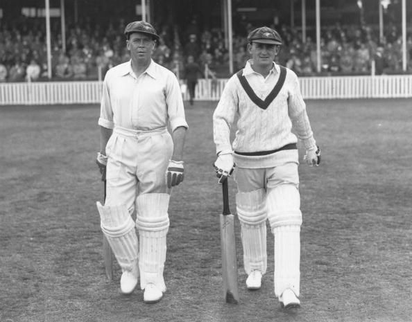 Bill Ponsford (left) striding out to bat alongside Stan McCabe