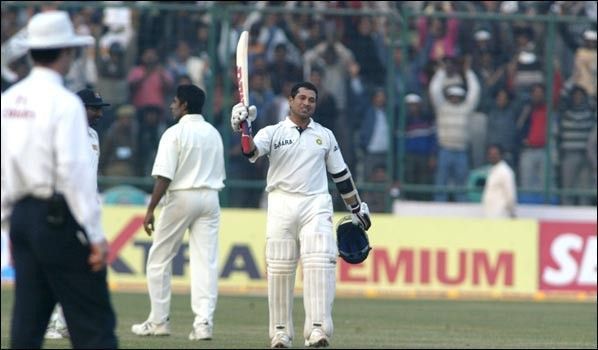 Tendulkar brings up his century against Sri Lanka at New Delhi. 