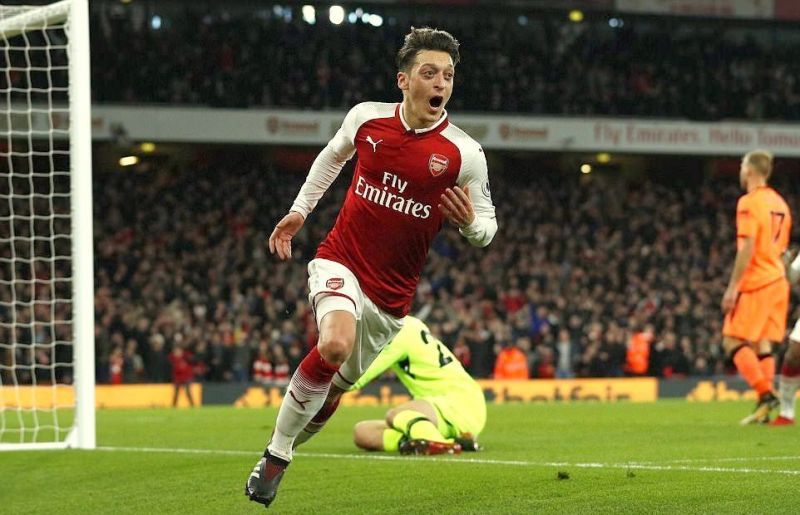 Mesut Ozil celebrating after an amazing comeback in what was one of the most entertaining games of the season. 